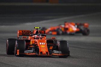 Charles Leclerc, Ferrari SF90, leads Sebastian Vettel, Ferrari SF90