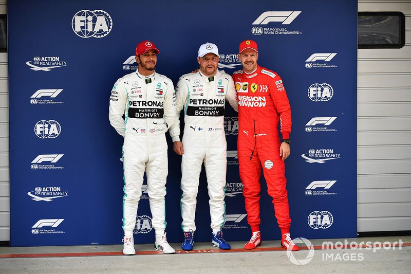 Top three Qualifiers Lewis Hamilton, Mercedes AMG F1, pole man Valtteri Bottas, Mercedes AMG F1, and Sebastian Vettel, Ferrari