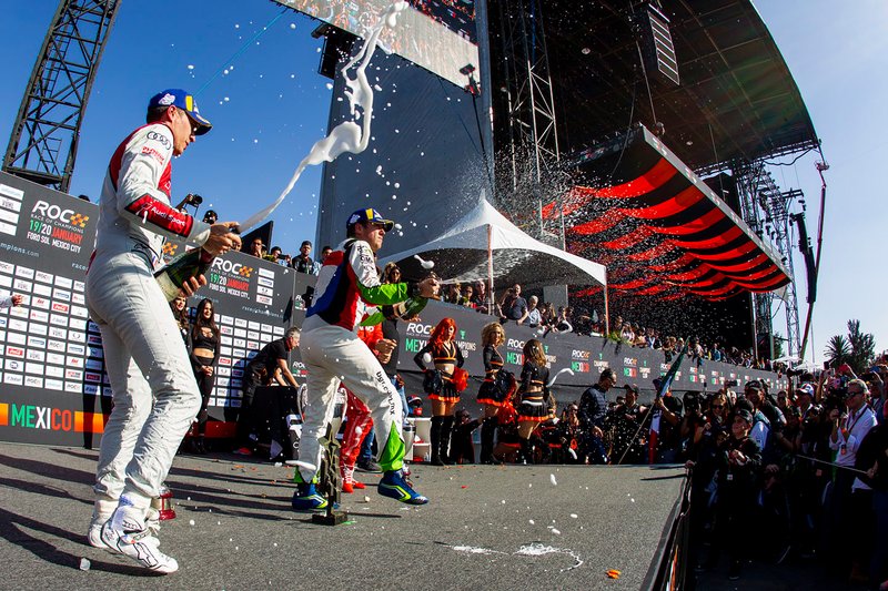 Winner Benito Guerra celebrates on the podium with runner up Loic Duval and ROC Skills Challenge winner Sebastian Vettel