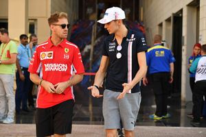 Sebastian Vettel, Ferrari and Esteban Ocon, Racing Point Force India