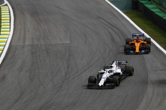 Lance Stroll, Williams FW41, leads Stoffel Vandoorne, McLaren MCL33
