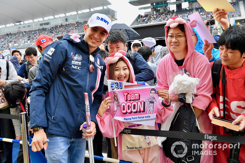 Esteban Ocon, Racing Point Force India F1 Team takes photograph with fans