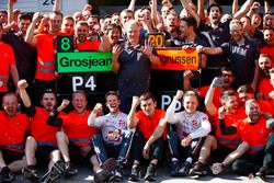 Romain Grosjean, Haas F1 Team, Kevin Magnussen, Haas F1 Team, and the Haas F1 team celebrate the team's best finish to date