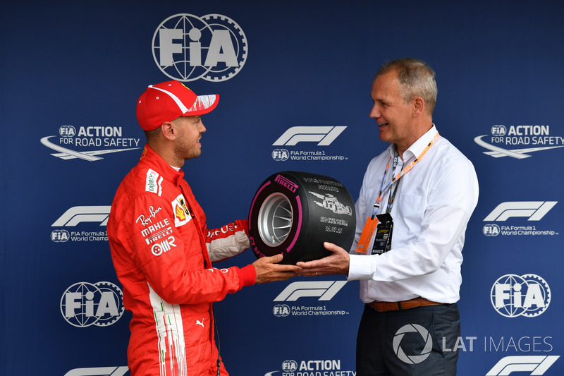 Sebastian Vettel, Ferrari receives the Pirelli Pole Position Award in parc ferme