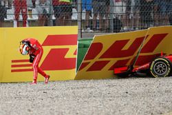 Sebastian Vettel, Ferrari SF71H walks in after crashing out of the race