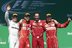 Second place Valtteri Bottas, Mercedes AMG F1, Race winner Sebastian Vettel, Ferrari, Giuseppe Vieti