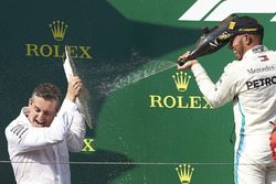 The Mercedes Constructors trophy delegate and race winner Lewis Hamilton, Mercedes AMG F1, on the podium