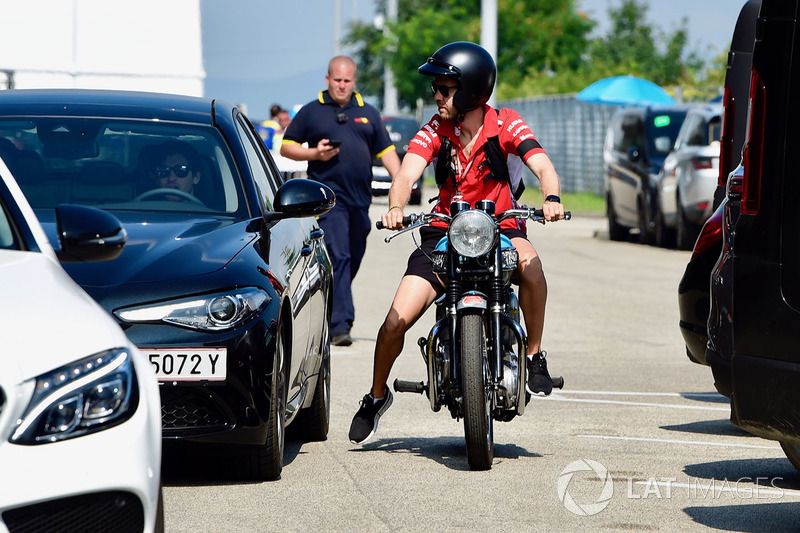 Sebastian Vettel, Ferrari on his Triumph motorbike