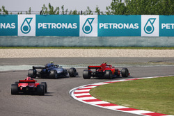 Valtteri Bottas, Mercedes AMG F1 W09, passes Kimi Raikkonen, Ferrari SF71H, for the lead of the race. Sebastian Vettel, Ferrari SF71H, follows