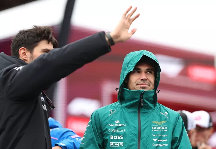 Lance Stroll, Aston Martin Racing, Esteban Ocon, Haas F1 Team