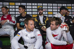 Jenson Button and Sebastian Vettel, talk during the drivers briefing backstage