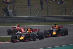 Daniel Ricciardo, Red Bull Racing RB13, leads Max Verstappen, Red Bull Racing RB13, and Kimi Raikkon