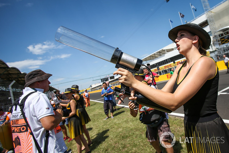 Grid girl fires T-Shirts into the crowd with a T-Shirt Gun
