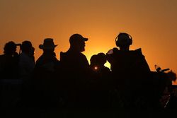 Fans at sunset