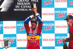Podium: second place Rubens Barrichello, Jordan, third place Eddie Irvine, Jordan