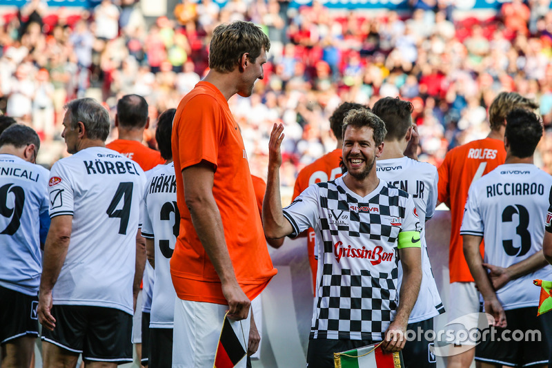 Dirk Nowitzki, jugador de la NBA y Sebastian Vettel, Ferrari