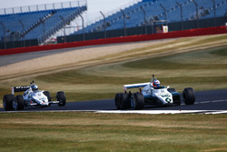Jenson Button drives a 1982 Williams FW08B, ahead of Guy Martin in a 1983 Williams FW08C