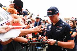 Max Verstappen, Red Bull, signs autographs for fans