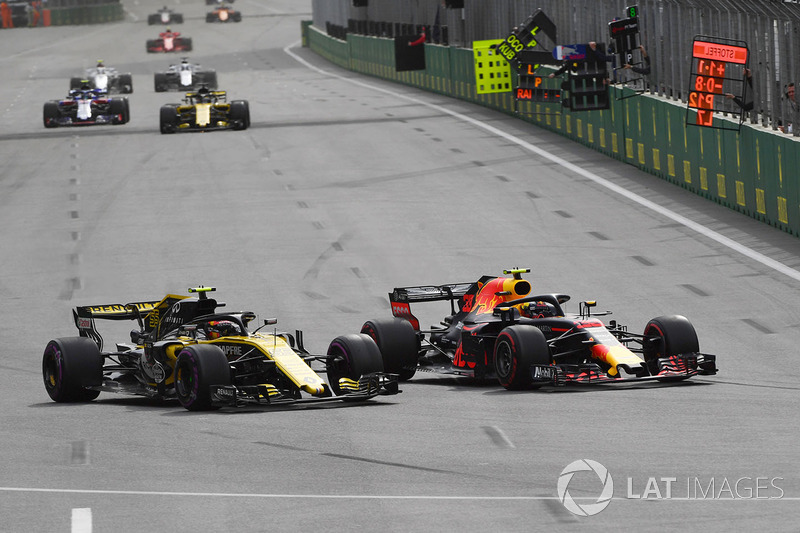 Max Verstappen, Red Bull Racing RB14 and Carlos Sainz Jr., Renault Sport F1 Team R.S. 18 battle