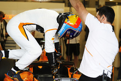 Fernando Alonso, McLaren, climbs out of his car
