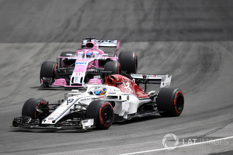 Marcus Ericsson, Sauber C37 and Sergio Perez, Force India VJM11