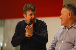 Mark Higgins and representatives from Albatec Racing talk to Henry Hope-Frost on the Autosport Stage