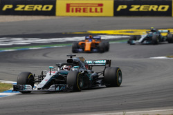 Lewis Hamilton, Mercedes AMG F1 W09, leads Fernando Alonso, McLaren MCL33, and Valtteri Bottas, Mercedes AMG F1 W09