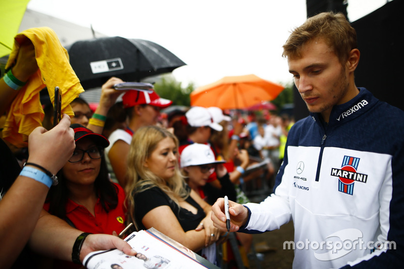 Sergey Sirotkin, Williams, signs autographs for fans