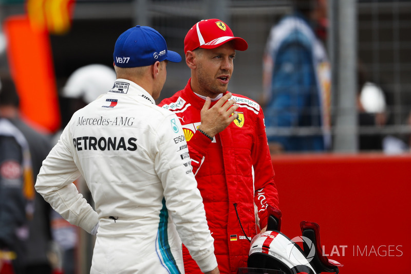 Valtteri Bottas, Mercedes AMG F1, congratulates Sebastian Vettel, Ferrari