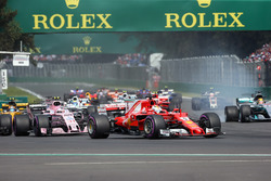 Lewis Hamilton, Mercedes-Benz F1 W08 with rear puncture at the start of the race after colliding with Sebastian Vettel, Ferrari SF70H