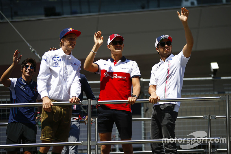 Brendon Hartley, Toro Rosso, Marcus Ericsson, Sauber, and Sergio Perez, Force India, in the drivers parade