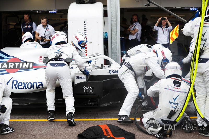 Lance Stroll, Williams FW41, makes a pit stop