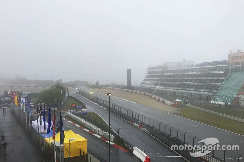 Fog covers the start/finish straight near the Dorint hotel