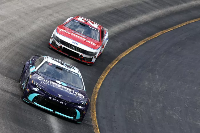 Tyler Reddick, 23XI Racing; Josh Berry, Wood Brothers Racing