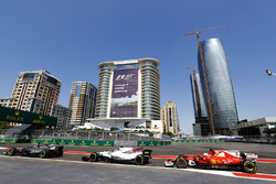 Romain Grosjean, Haas F1 Team VF-17, Felipe Massa, Williams FW40 and Sebastian Vettel, Ferrari SF70H