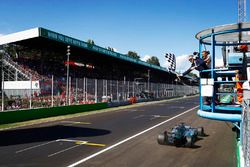 Lewis Hamilton, Mercedes AMG F1 W08, takes the chequered flag to win the race