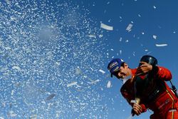 Lucas di Grassi, ABT Schaeffler Audi Sport, sprays the champagne on the podium