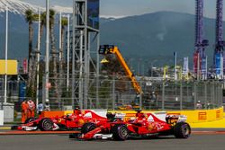 Kimi Raikkonen, Ferrari SF70H and Sebastian Vettel, Ferrari SF70H runs wide