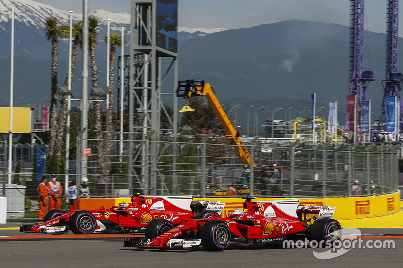 Kimi Raikkonen, Ferrari SF70H and Sebastian Vettel, Ferrari SF70H runs wide