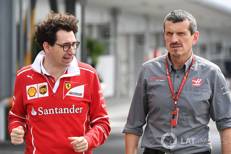 Mattia Binotto, Ferrari Chief Technical Officer and Guenther Steiner, Haas F1 Team Principal