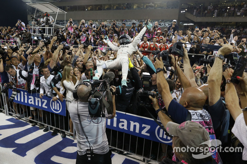 Second place and new world champion Nico Rosberg, Mercedes AMG Petronas F1 celebrates in parc ferme