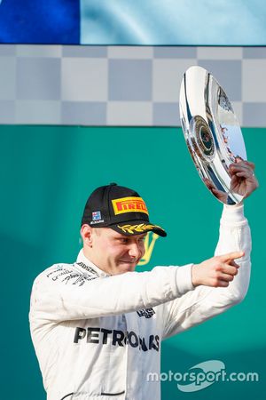 Valtteri Bottas, Mercedes AMG, 3rd Position, celebrates with his trophy