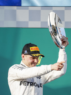 Valtteri Bottas, Mercedes AMG, 3rd Position, celebrates with his trophy