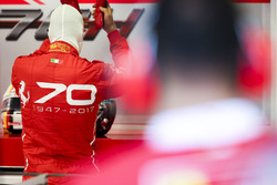 Sebastian Vettel, Ferrari, a Ferrari 70th anniversary design on his overalls