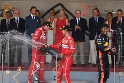 Kimi Raikkonen, Ferrari, race winner Sebastian Vettel, Ferrari and Daniel Ricciardo, Red Bull Racing celebrate on the podium with the champagne