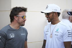 Fernando Alonso, McLaren, and Lewis Hamilton, Mercedes AMG