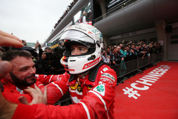 Sebastian Vettel, Ferrari celebrates with his team in parc ferme