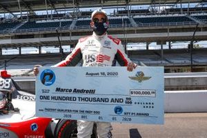 Marco Andretti, Andretti Herta with Marco & Curb-Agajanian Honda celebrates after winning the NTT P1 Award and pole with $100,000 check