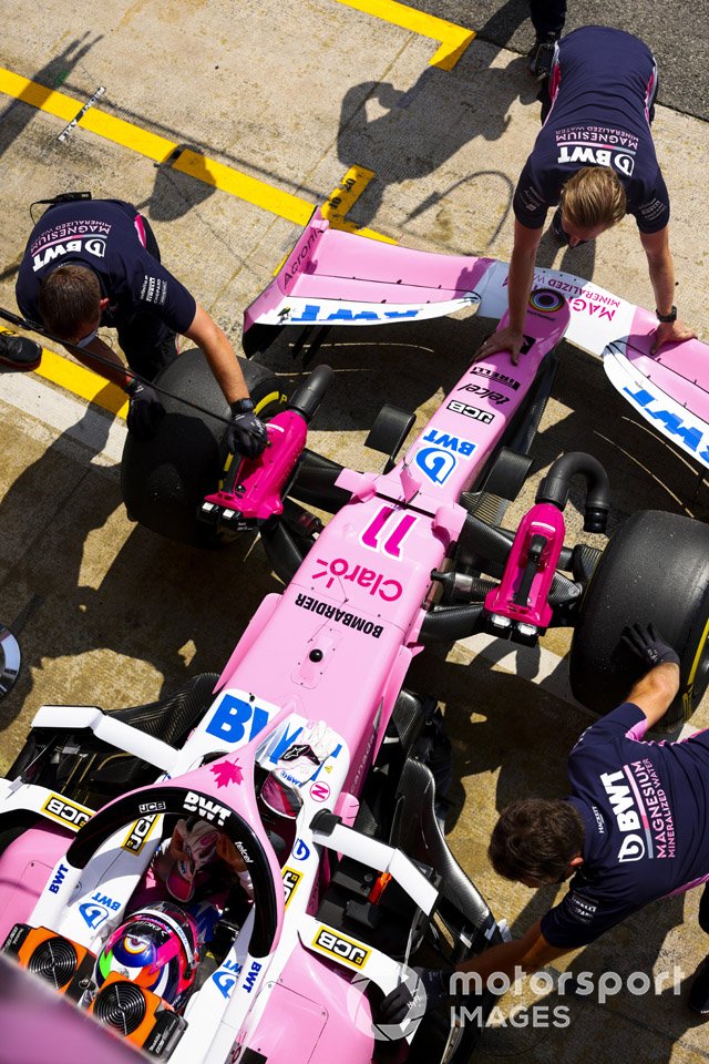 Sergio Perez, Racing Point RP20, is returned to the garage