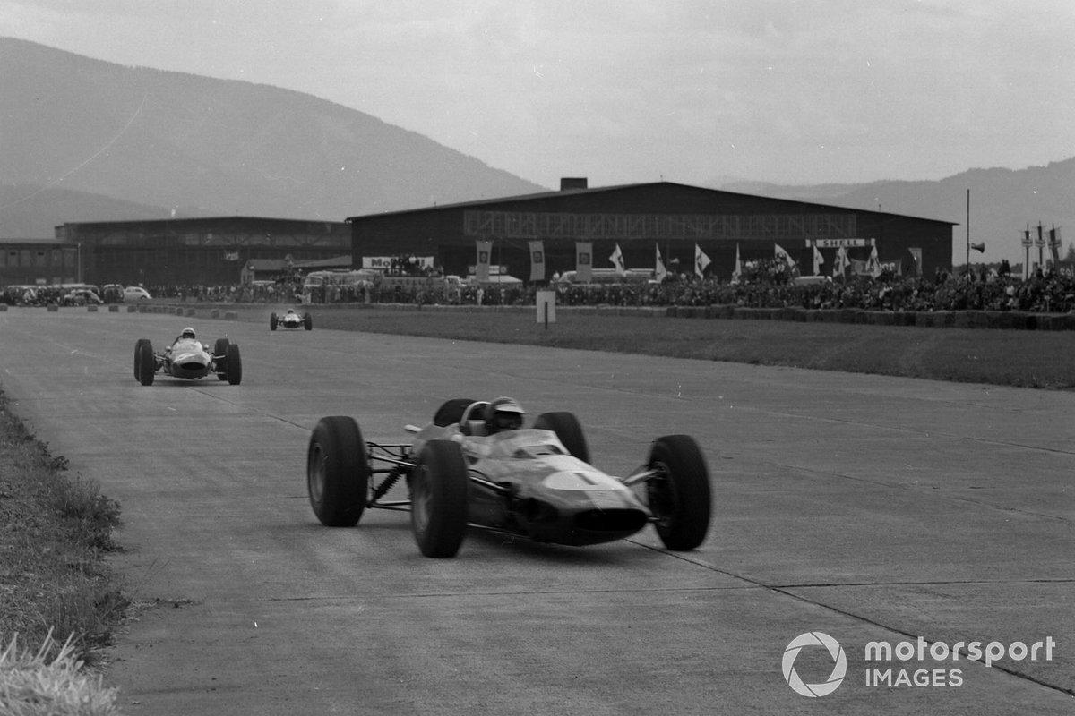 Jim Clark, Lotus 33 Climax, leads Lorenzo Bandini, Ferrari 156 Aero